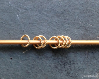 Seven stitch markers, solid copper with gold finish, twisted rings for knitting (medium)