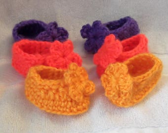 3 Pairs of Bright Neon Slippers with Crocheted Flower...Baby Girl.. Newborn Size....Suitable For All Seasons