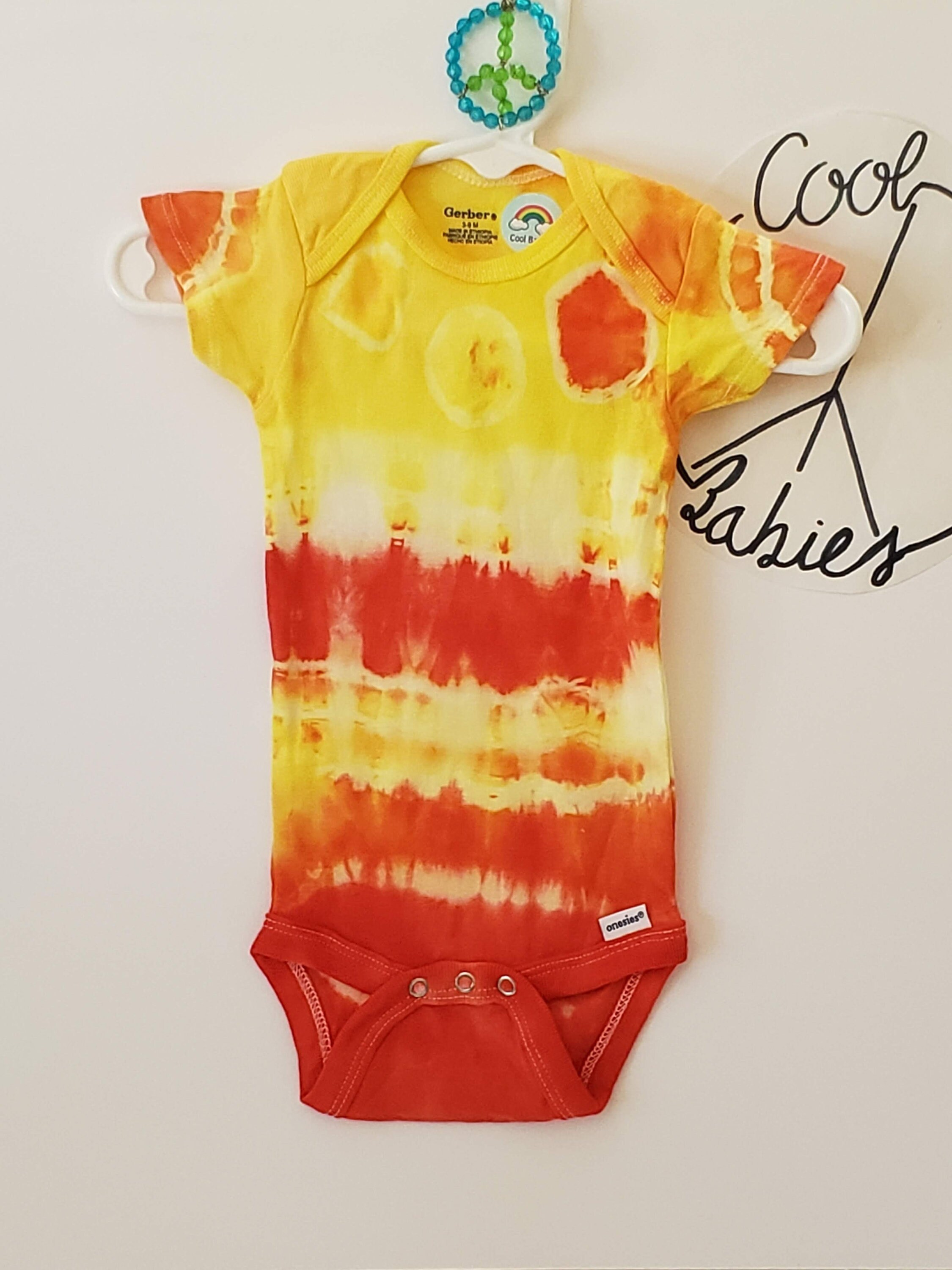 orange onesie baby