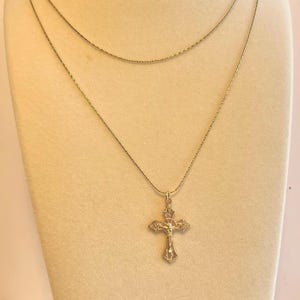Layered gold cross necklace