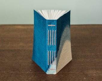 Subtle little notebook with cave paper covers