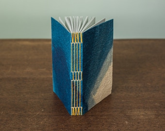 Cave paper notebook / sketchbook with lightly speckled interior pages