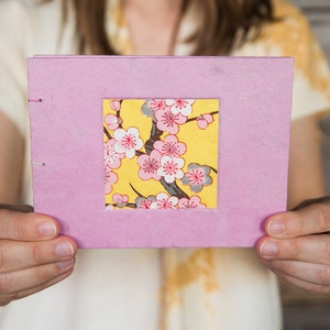 Handmade book with pink cherry blossoms