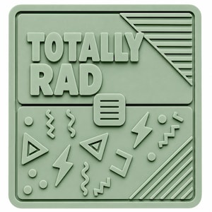 May include: A square sage green silicone patch featuring the embossed text TOTALLY RAD in a bold font. The design includes a geometric pattern with lightning bolts, triangles, circles, and wavy lines, along with a small square icon with three lines.