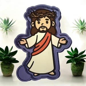 May include: A white ceramic mug with a black handle and the text "But First, Coffee" in a black, bold font. The mug is on a white surface.