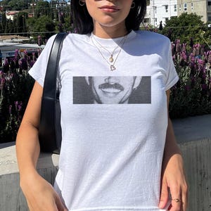 Dom Dolla Baby Tee: Y2K Rave Crop Top - Music Festival Shirt