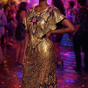 dreaming of wearing a gold dress Vivid Dreams Strapless Sequin Romper Gold main image 0