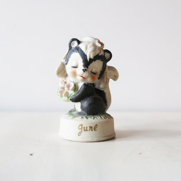 Vintage cute little raccoon bride figurine marked June