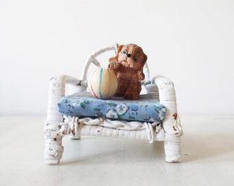 Vintage china puppy with ball on wicker chair figurine