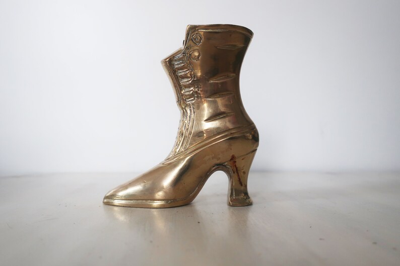 Vintage brass victorian shoe or boot