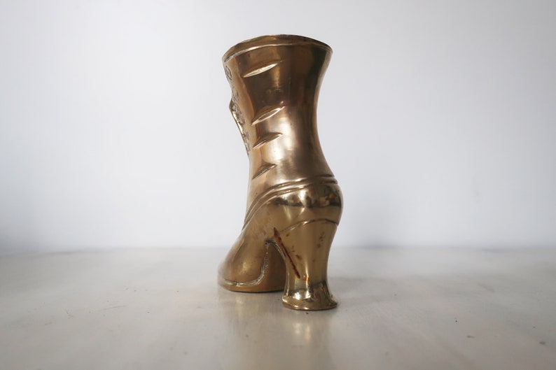 Vintage brass victorian shoe or boot