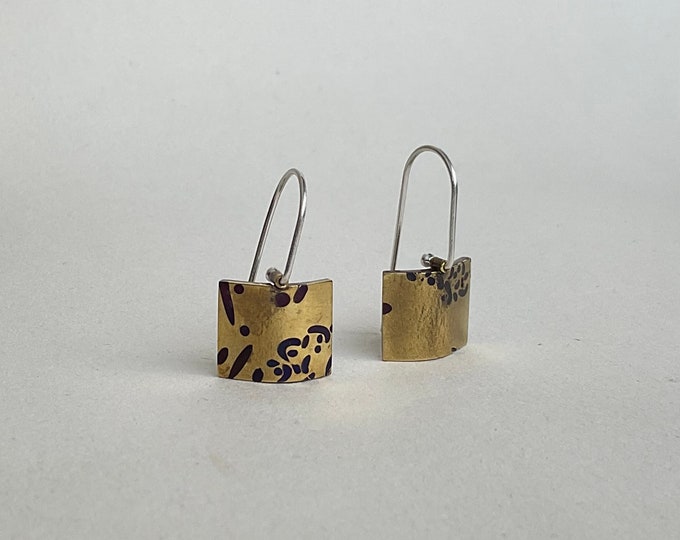 Earrings tavus