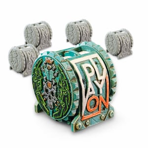 May include: A set of five cylindrical game tokens featuring a skull emblem on the side and the text PLAY ON in raised lettering. The front token is painted in teal, silver, and orange, while the four tokens in the background are unpainted gray.