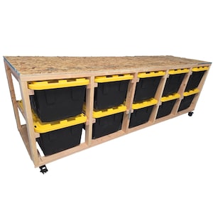 May include: A wooden storage shelf with wheels, featuring eight black storage bins with yellow lids. The shelf has a plywood top.
