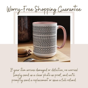 May include: A white ceramic mug with a pink interior and handle, decorated with a black geometric pattern. The mug is on a wooden surface with a spoon and a macaron. The text "Worry-Free Shopping Guarantee" is at the top.