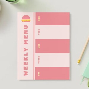 May include: A pink and white striped weekly menu planner with a cartoon hamburger icon and the text "WEEKLY MENU". The planner has spaces for each day of the week: Monday, Tuesday, Wednesday, Thursday, Friday.