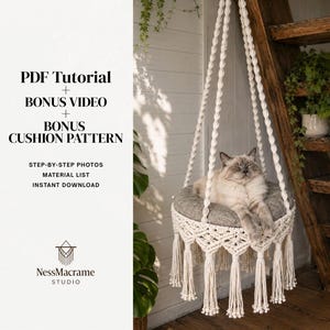 May include: A cream-colored macrame cat hammock with a round grey cushion, featuring intricate knotted patterns and long fringe tassels. The text reads: PDF Tutorial + BONUS VIDEO + BONUS CUSHION PATTERN, STEP-BY-STEP PHOTOS, MATERIAL LIST, INSTANT DOWNLOAD.
