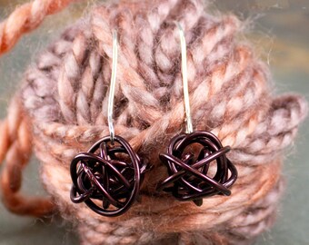 Ball of yarn earrings make great gifts for knitters, wool lovers, sheep farmers, and crafts people, yarn balls are copper and silver