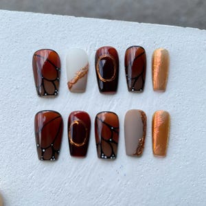 Elegant Brown Gradient Press On Nails  Autumn-Inspired Brown and Gold Nails  Sophisticated Butterfly Nail Art  Chic Brown Acrylic Nails