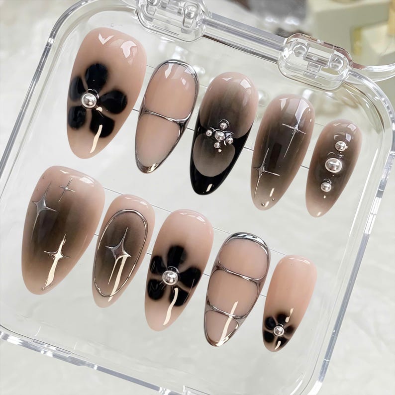 Silver chrome accented press on nails, short almond nude base. Hand-painted elegant dark aesthetic holiday birthday nails