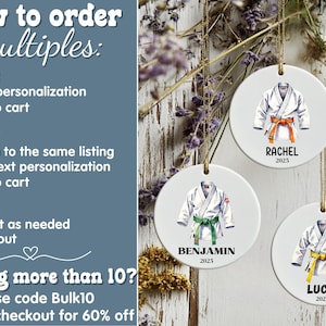 May include: White ceramic ornaments with watercolor illustrations of karate uniforms with orange, green, and yellow belts. Each ornament is personalized with a name and the year 2025. The ornaments hang from gold cords.
