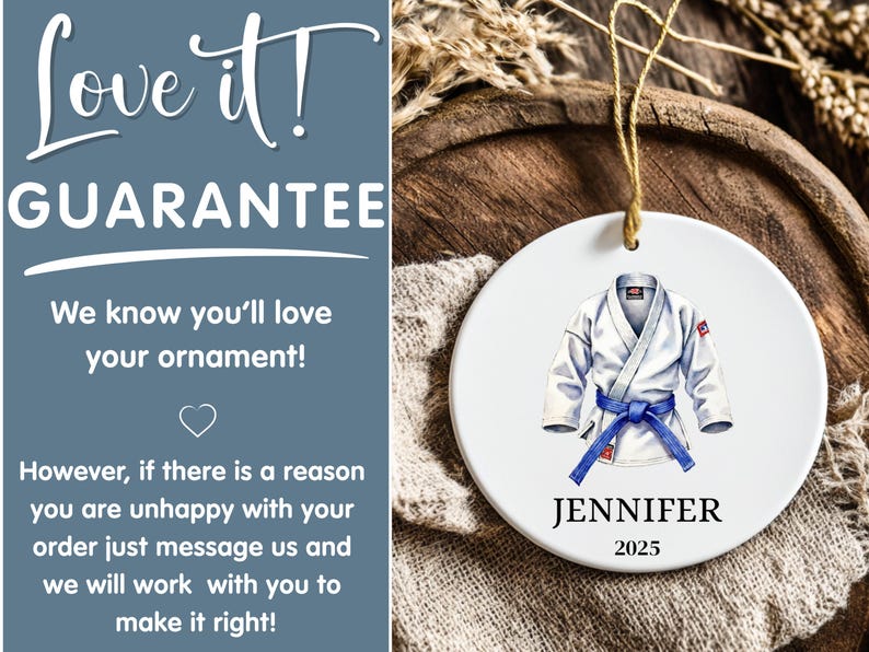 May include: A white ceramic ornament featuring a watercolor illustration of a judo gi with a blue belt. The ornament includes the name "JENNIFER" and the year "2025". It hangs by a gold string.