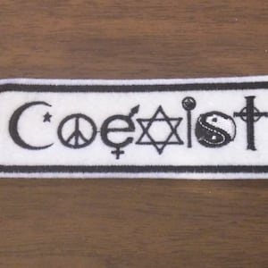 Koexistieren Sie gestickten Aufbügler