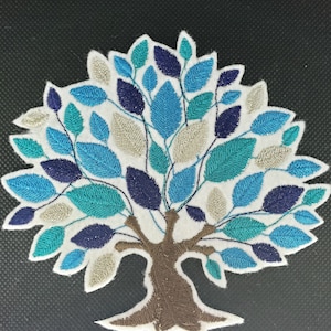 Tree of life with silver and shades of blue embroidered iron on patch