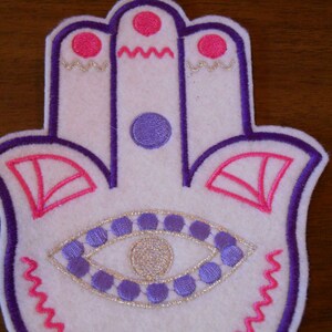 6.75 inch art deco style embroidered hamsa iron on patch shades of purple, hot pink and silver