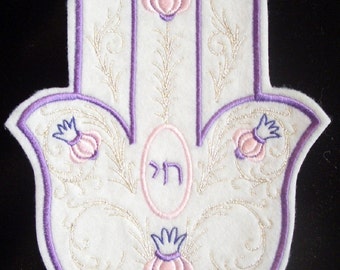 Elegant embroidered hamsa with silver swirls and pink and purple accents iron on patch