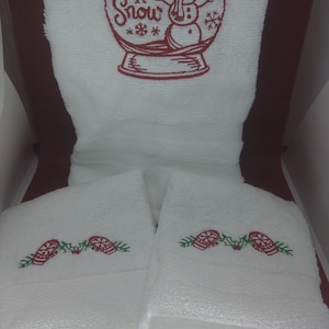 Holiday themed towel and washcloth set, embroidered