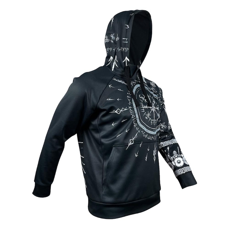 May include: Black hooded sweatshirt with a white print of a compass and runes. The print covers the entire front and one sleeve.