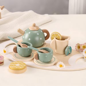 May include: A set of three ceramic mugs with a speckled, matte finish. The mugs are in shades of cream, light gray, and dark gray. Each mug has a simple, minimalist design, perfect for coffee or tea.