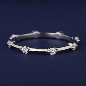 14K white gold diamond station band with evenly spaced diamonds, perfect for stacking or solo wear.
diamond station band, white gold ring, minimalist sparkle, dainty design, stacking band, wedding band, eternity ring, anniversary gift, fine jewelry, elegant ring, bridal accessory, simple band, gold clarity, daily ring, chic design