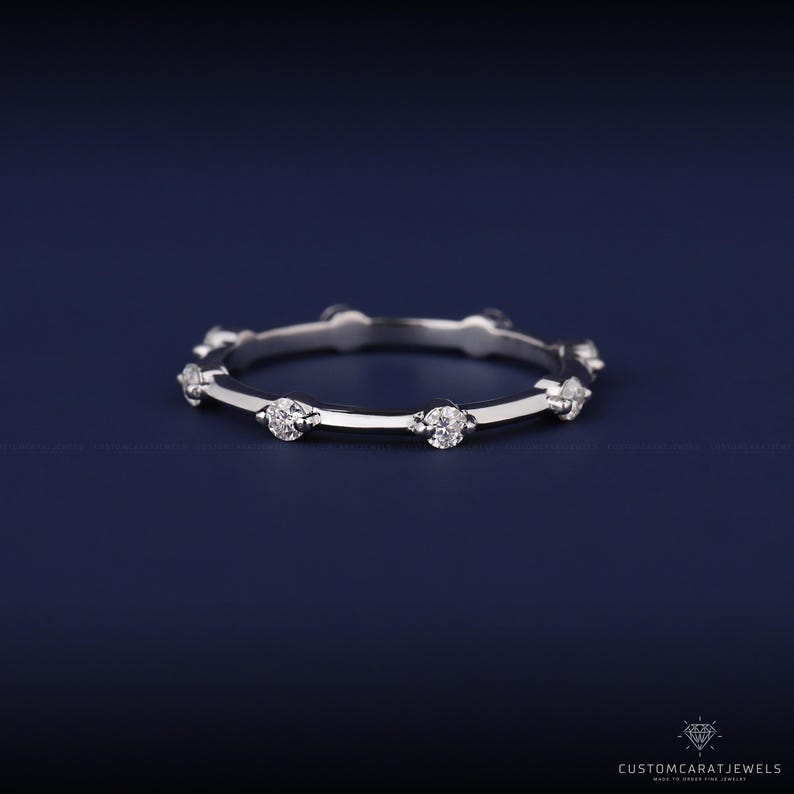 14K white gold diamond station band with evenly spaced diamonds, perfect for stacking or solo wear.
diamond station band, white gold ring, minimalist sparkle, dainty design, stacking band, wedding band, eternity ring, anniversary gift, fine jewelry, elegant ring, bridal accessory, simple band, gold clarity, daily ring, chic design