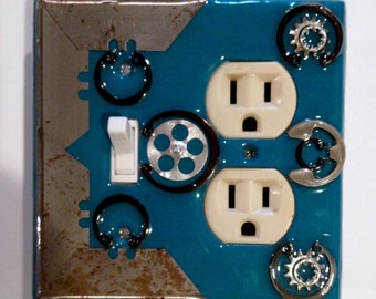 Toggle and outlet combo switch plate