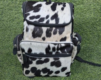 Zaino in pelle di vacchetta, borsa da viaggio grande in pelle nera e bianca, zaino per pannolini in stile western unico per lei