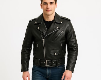 May include: Black leather jacket with an asymmetrical zipper closure, multiple pockets, and a belted waist. The jacket features silver-toned hardware and a classic biker style. The model is wearing blue jeans and a black shirt.