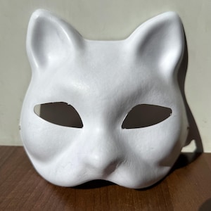 Maschera da gatto teriano in cartapesta bianca: maschera fai da te