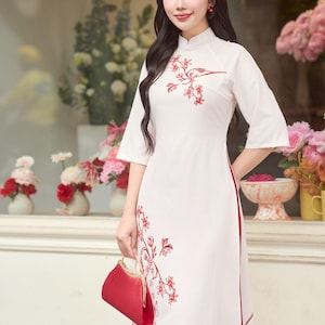 Kant-en-klare traditionele Vietnamese vrouwen met Ao Dai - Set met verschillende items