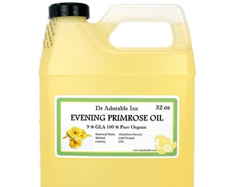 May include: A clear plastic bottle with a yellow liquid inside. The label reads "Dr Adorable Inc 32 oz EVENING PRIMROSE OIL 9% GLA 100% Pure Organic".