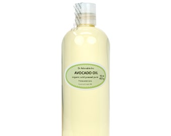 May include: A clear glass bottle of organic cold-pressed avocado oil, labeled "Dr Adorable Inc. Avocado Oil 16 oz (453 g) Persea americana".