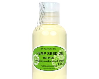 May include: A clear glass bottle with a green label that reads "Dr. Adorable Inc. HEMP SEED OIL REFINED 100% pure cold pressed organic Cannabis sativa 4.4 fl.oz. Country of origin Canada."