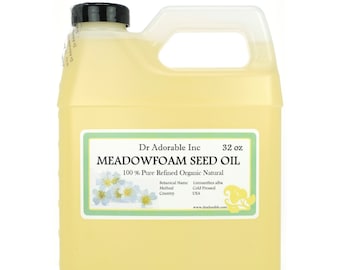 May include: A clear plastic bottle containing 32 ounces of Meadowfoam Seed Oil. The label is white with green borders and reads "Dr. Adorable Inc. Meadowfoam Seed Oil 100% Pure Refined Organic Natural Botanical Name Limnanthes alba Method Cold Pressed Country USA www.dradorable.com"