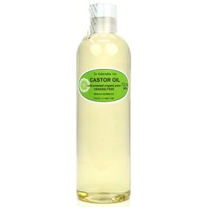 May include: A clear glass bottle of 12.02 oz (340g) of cold-pressed organic castor oil. The bottle has a green label with the text "Dr Adorable Inc. Castor Oil, cold pressed organic pure, HEXANE FREE, Ricinus communis, Country of origin India".