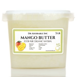 May include: A white plastic container filled with 3 pounds of mango butter. The label reads "DR ADORABLE INC MANGO BUTTER 100% PURE ORGANIC NATURAL" and includes details about the product, such as the botanical name, method, part, usage rate, and country of origin. The label also features a small image of a mango.