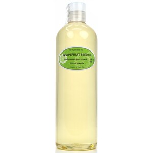 May include: A clear glass bottle of 16 ounce (455 grams) grapefruit seed oil. The label reads "Dr Adorable Inc Grapefruit Seed Oil cold pressed pure organic Citrus paradisi Country of origin USA".