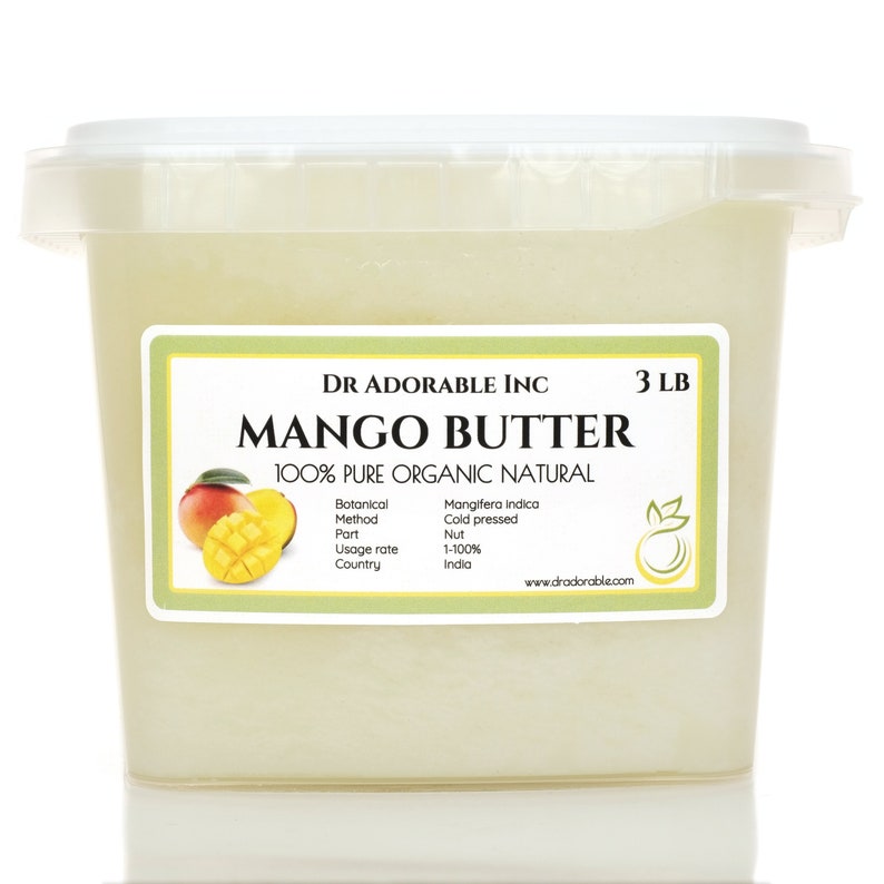 May include: A white plastic container filled with 3 pounds of mango butter. The label reads "DR ADORABLE INC MANGO BUTTER 100% PURE ORGANIC NATURAL" and includes details about the product, such as the botanical name, method, part, usage rate, and country of origin. The label also features a small image of a mango.
