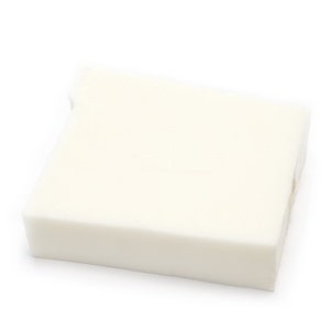 May include: A white rectangular block of soap.