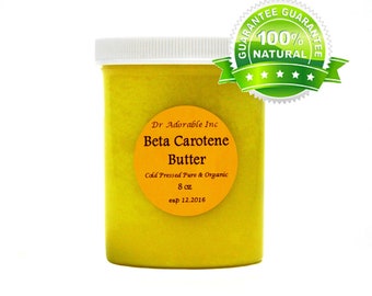 Puede incluir: Un tarro amarillo de mantequilla de betacaroteno, etiquetado con "Dr. Adorable Inc. Beta Carotene Butter, Cold Pressed Pure & Organic, 8 oz, exp 12.2016". Una pegatina verde y blanca con el texto "Guarantee 100% Natural" está en el tarro.